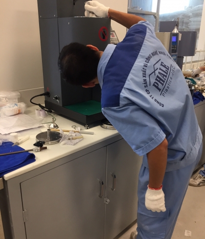 Handing over the MFI 452 flow index meter to Crystal Plastic Company